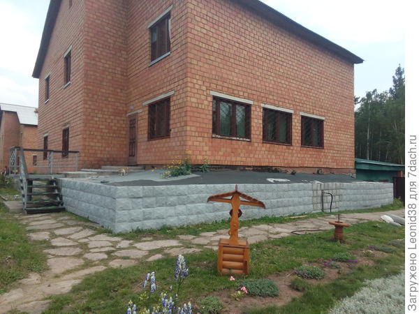 облицовываю фасад, сделанным камнем