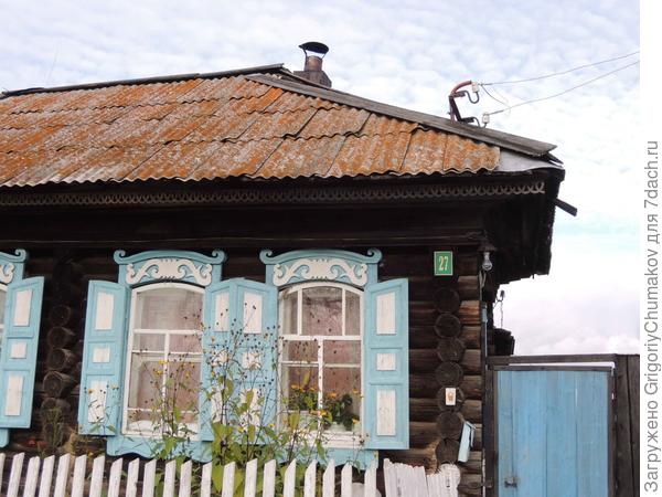 окна с наличниками