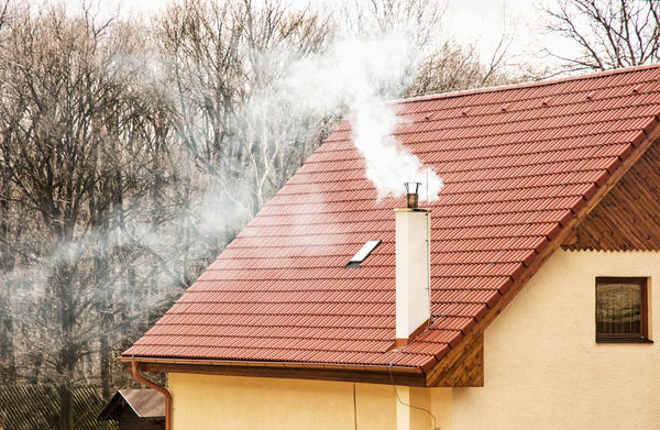 Проход дымохода через крышу. Фото