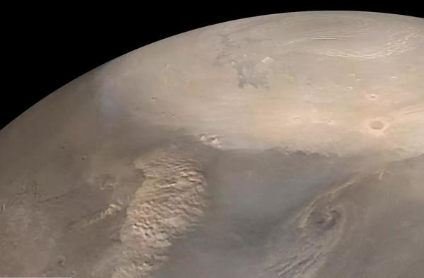Весенние пылевые бури на северном полюсе Марса. Фото с сайта nasa.gov