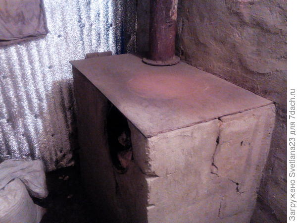 А вот с печкой что делать, может кто подскажет? чем её можно отделать.