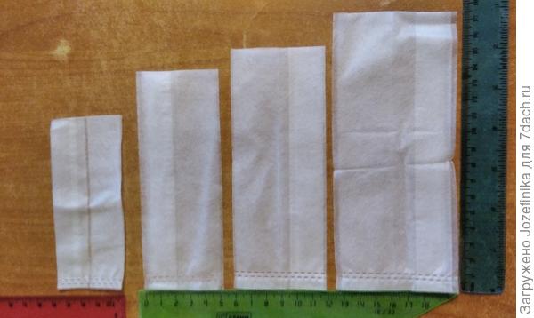 Пакетики из нетканки - четырехгранные. Томаты выращивала в пакетиках последних двух размеров