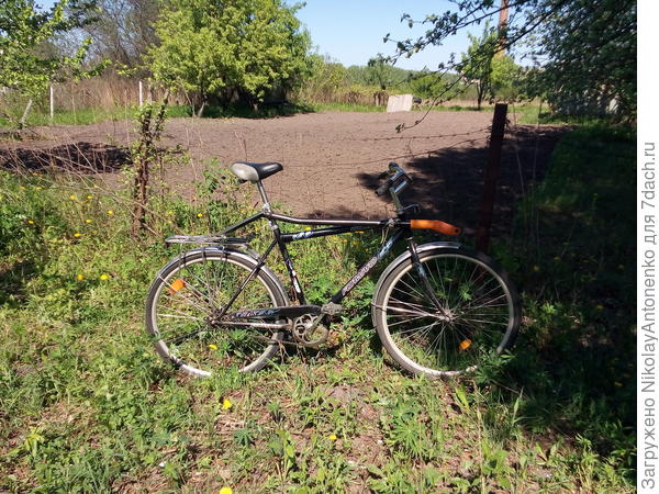 велосипед с лопатой