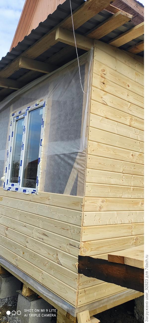 Установка окна и обшивка имитацией бруса..