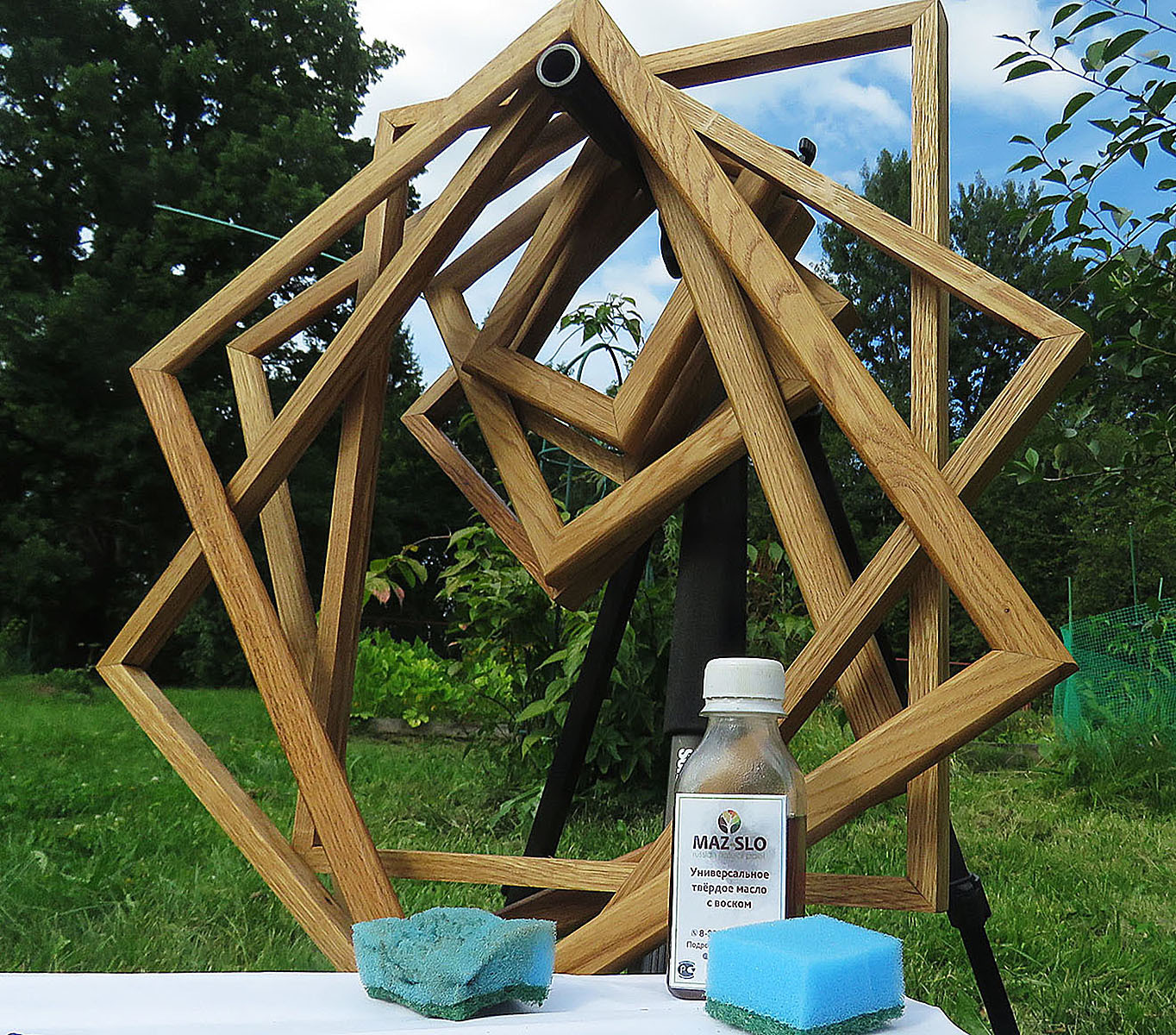 Удаляем излишки масла с поверхности (протираем чистой губкой). Вешаем сушиться - лучше на солнышко. Фото автора